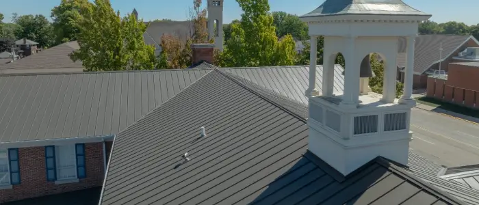 The top of a bank with new metal roofing installed by Sunset Metal