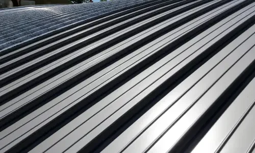 Standing Seam vs. Pro-Rib Metal Roofing: Understanding the Difference